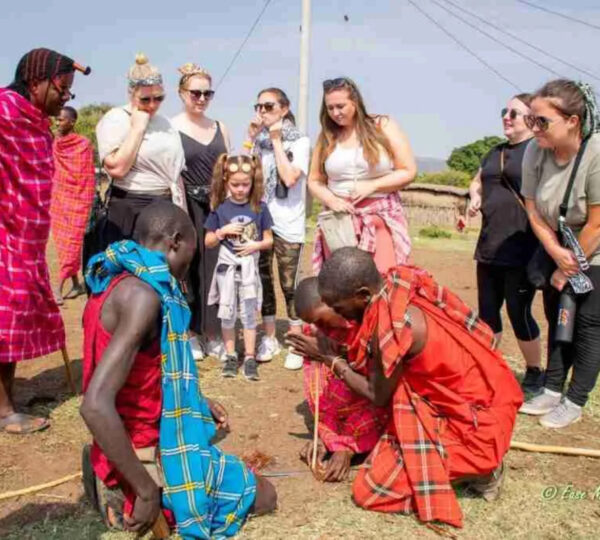 Guests-Learn-how-to-traditionally-light-a-fire-during-a-Maasai-Mara-Community-Village-Visit-1024x683-1 1 - Holidawn Adventure Maasai village visit during a Maasai Mara Safari